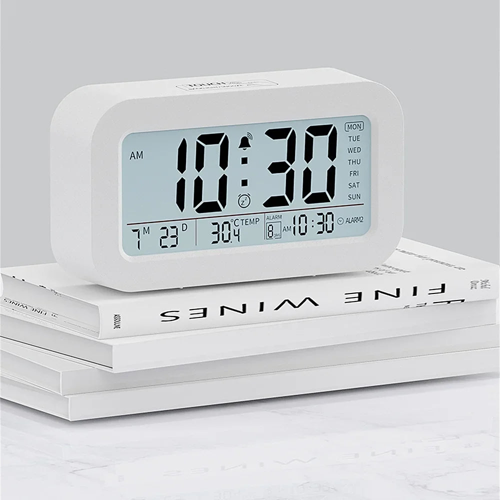 Battery Powered LCD Alarm Clock TEMP Date Week 3 Alarms Backlight Snooze Table  Clock Night Vision Function12/24H Digital Clock