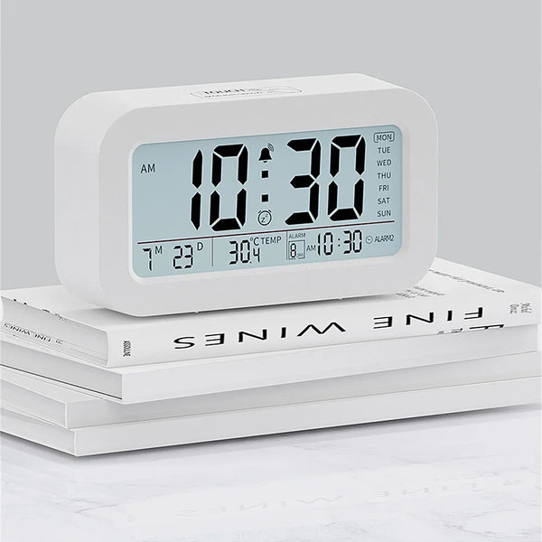 Battery Powered LCD Alarm Clock TEMP Date Week 3 Alarms Backlight Snooze Table  Clock Night Vision Function12/24H Digital Clock