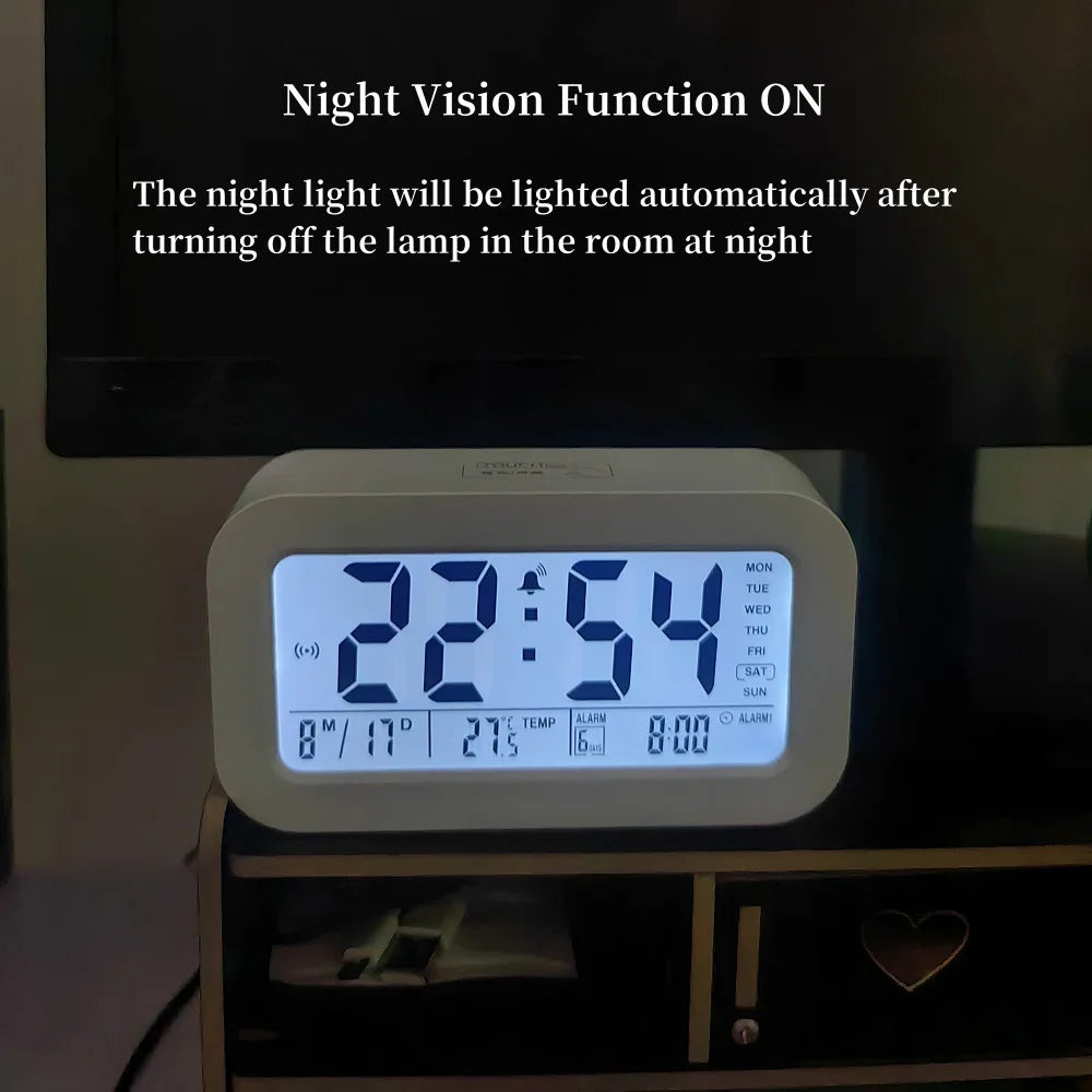 Battery Powered LCD Alarm Clock TEMP Date Week 3 Alarms Backlight Snooze Table  Clock Night Vision Function12/24H Digital Clock